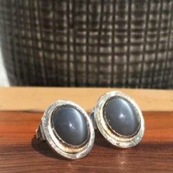 Oval grey moonstone white gold setting on silver earring