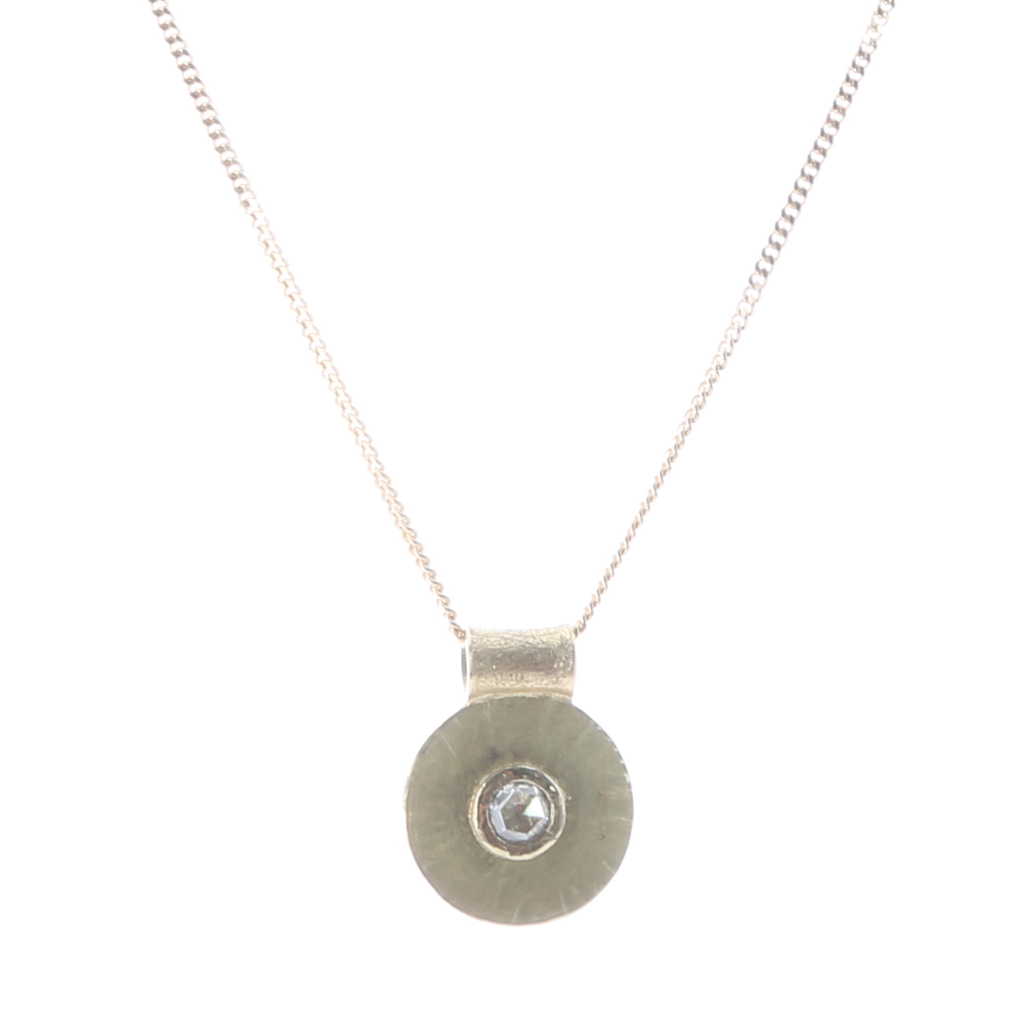 Rosecut diamond in yellow gold setting on rays gold disk was pendant on gold chain