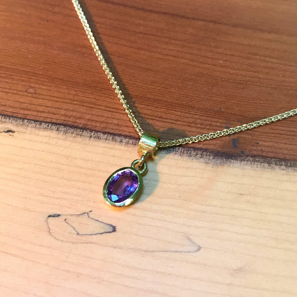 Purple Sapphire oval pendant setting in gold