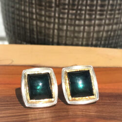 Cushion blue tourmaline in gold on silver studs