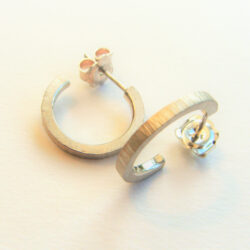 Silver rays style hoop earrings