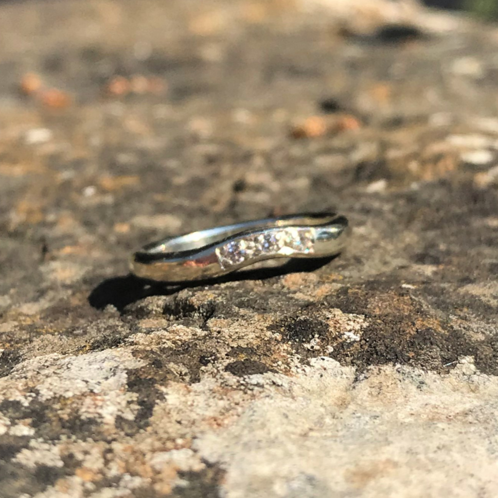 Diamonds set in white gold band