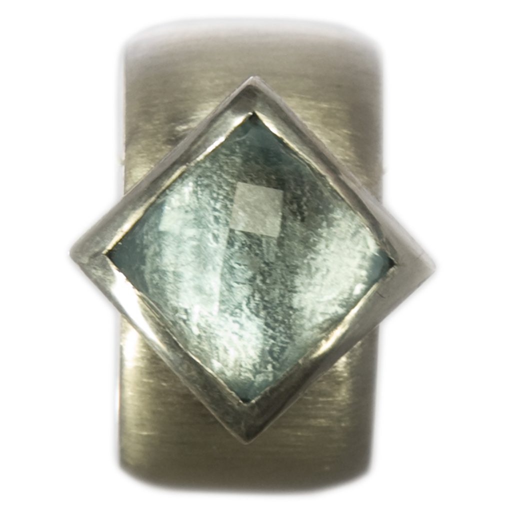square blue topaz offset silver setting on silver ring